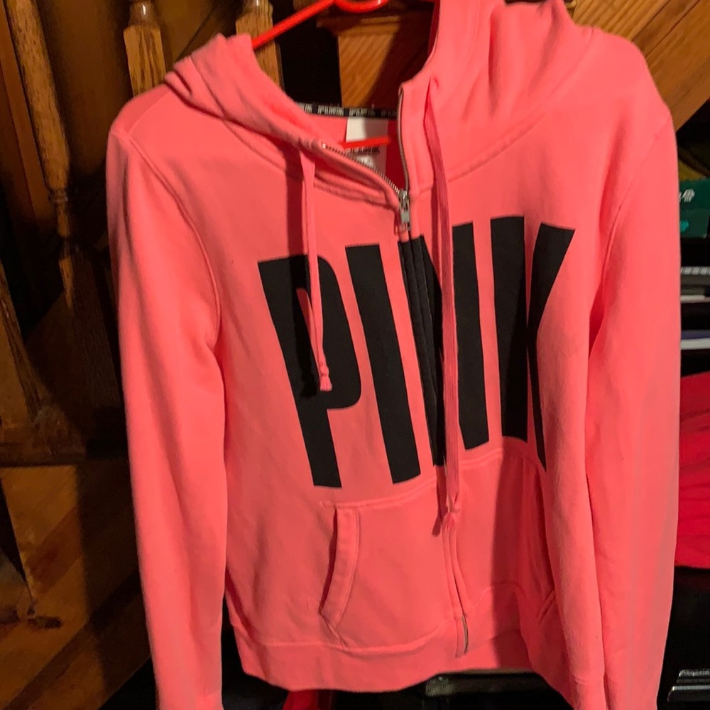 Pink sweater size large worm ones